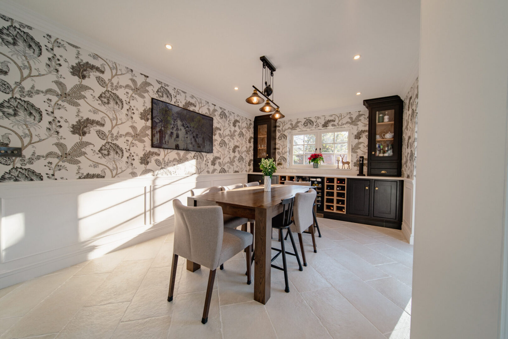 Elegant dining room with floral wallpaper