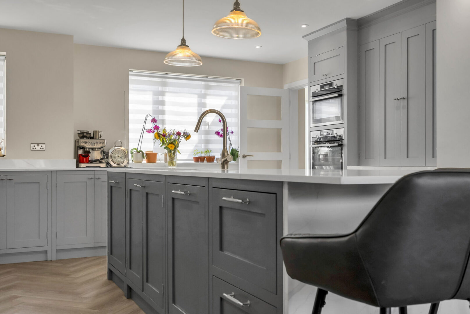 Contemporary grey kitchen design with flowers